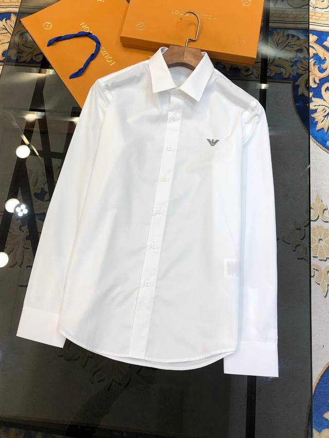 Hot selling Armani early spring new men's original single casual long sleeved shirt is available for simultaneous sale on the official website. It features a simple and fashionable slim fit, high-end version, original button customization, double str