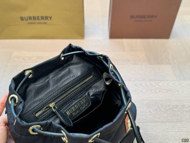 Burberry backpack has temperament and a sense of luxury, suitable for both men and women for daily travel. Its capacity is also very easy to carry by hand. Size 28 31