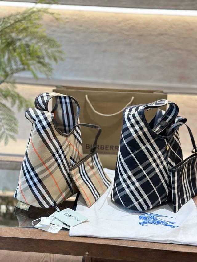 Burberry's new model has finally shipped its classic diagonal plaid backpack, which looks great. B's latest soft and upright shoulder bag is made of cotton twill fabric. Crafted in an Italian workshop, it is decorated with a unique grid pattern exclu