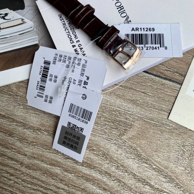 Original order new to Armani quartz women's watch. Versatile and stunning, with a starry dial that sparkles with extraordinary brilliance. Paired with a double needle design and a calf leather strap, the delicate grain adds an elegant and fashionable