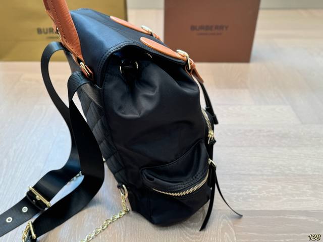 Burberry backpack has temperament and a sense of luxury, suitable for both men and women for daily travel. Its capacity is also very easy to carry by hand. Size 28 31