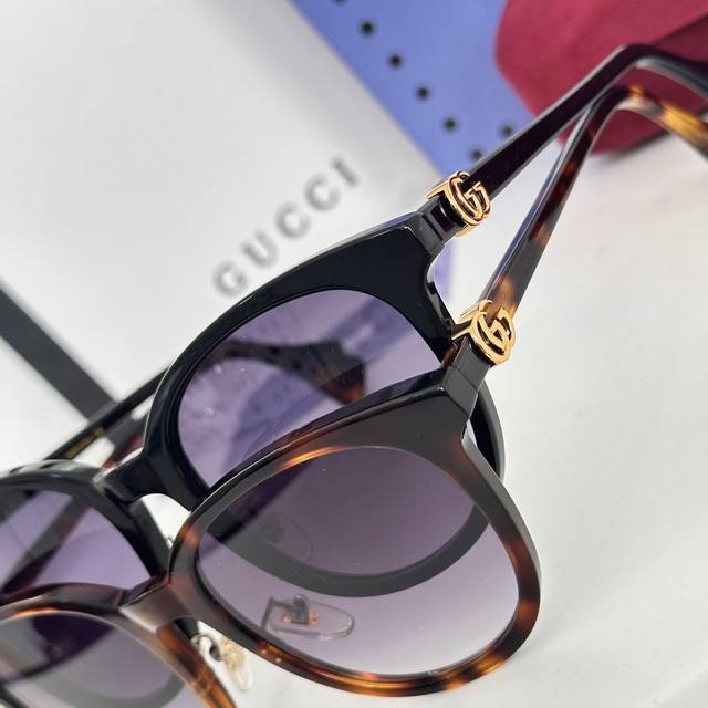 Detail image * Gucc * Guchi new sunglasses, Gg1073， Lightweight board, cat eye frame, dual G brand logo pays tribute to the classic. Size:54-21-145。 :