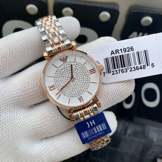 The original Armani Starry Sky women's watch model ar1926 features a gold and Ar1925 silver dial with a diameter of 32mm and a 316 stainless steel strap. Armani Starry Sky's diamonds are made of imported Swarovski crystal diamonds, including regular